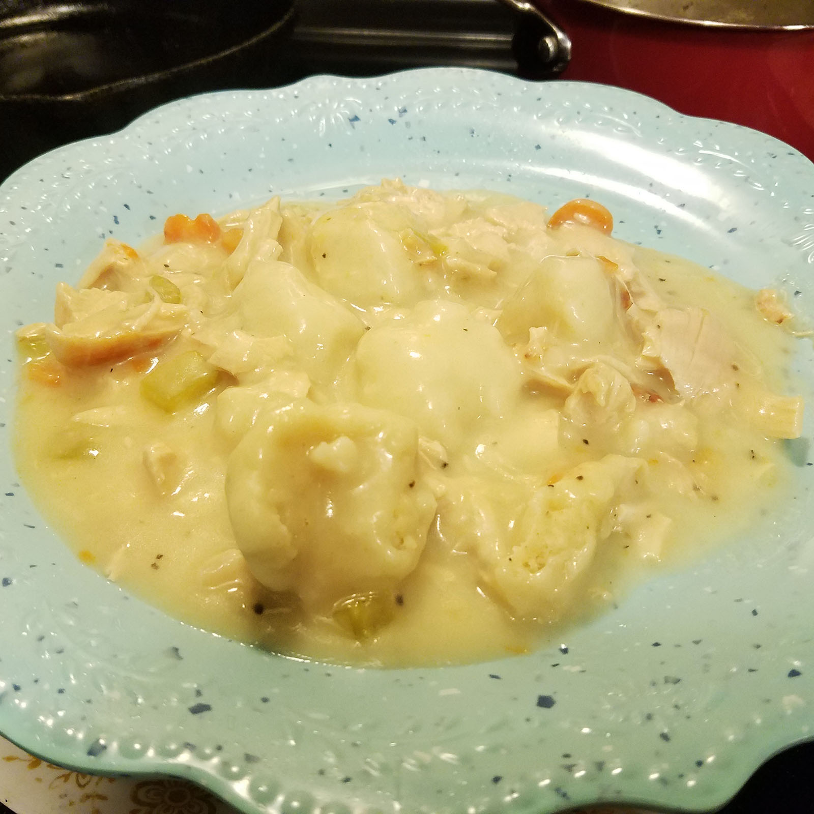 Old Fashion Chicken and Dumplings is a traditional dish topped with fresh homemade dumplings.