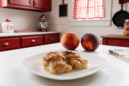 These peach dumplings are easy to make.
